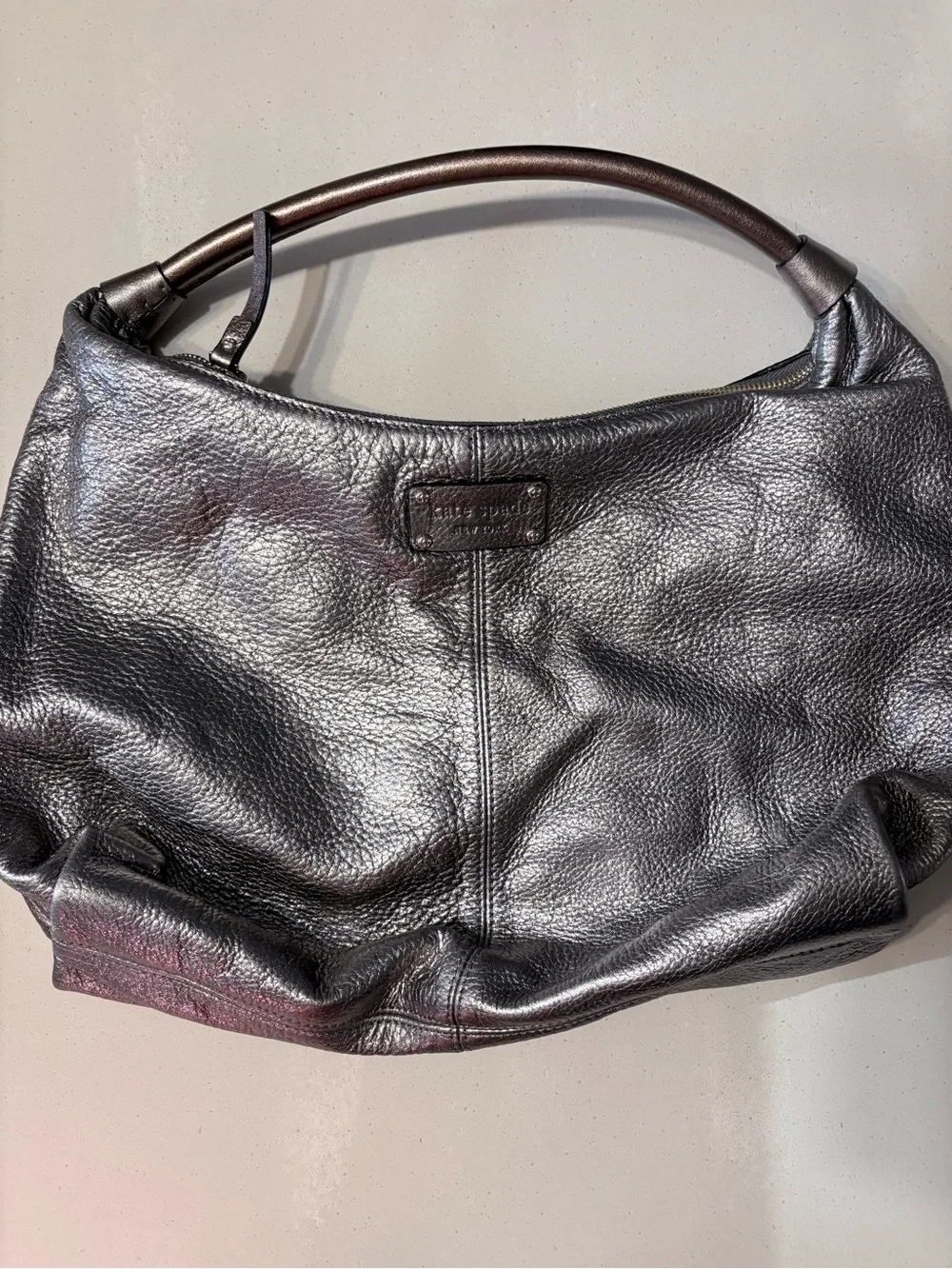 Kate Spade Janaya shiny silver hobo bag